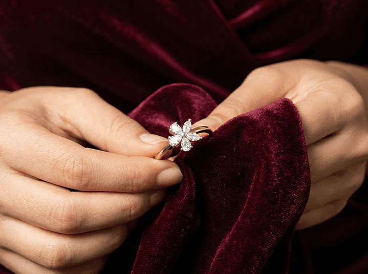 A diamond ring being gently polished