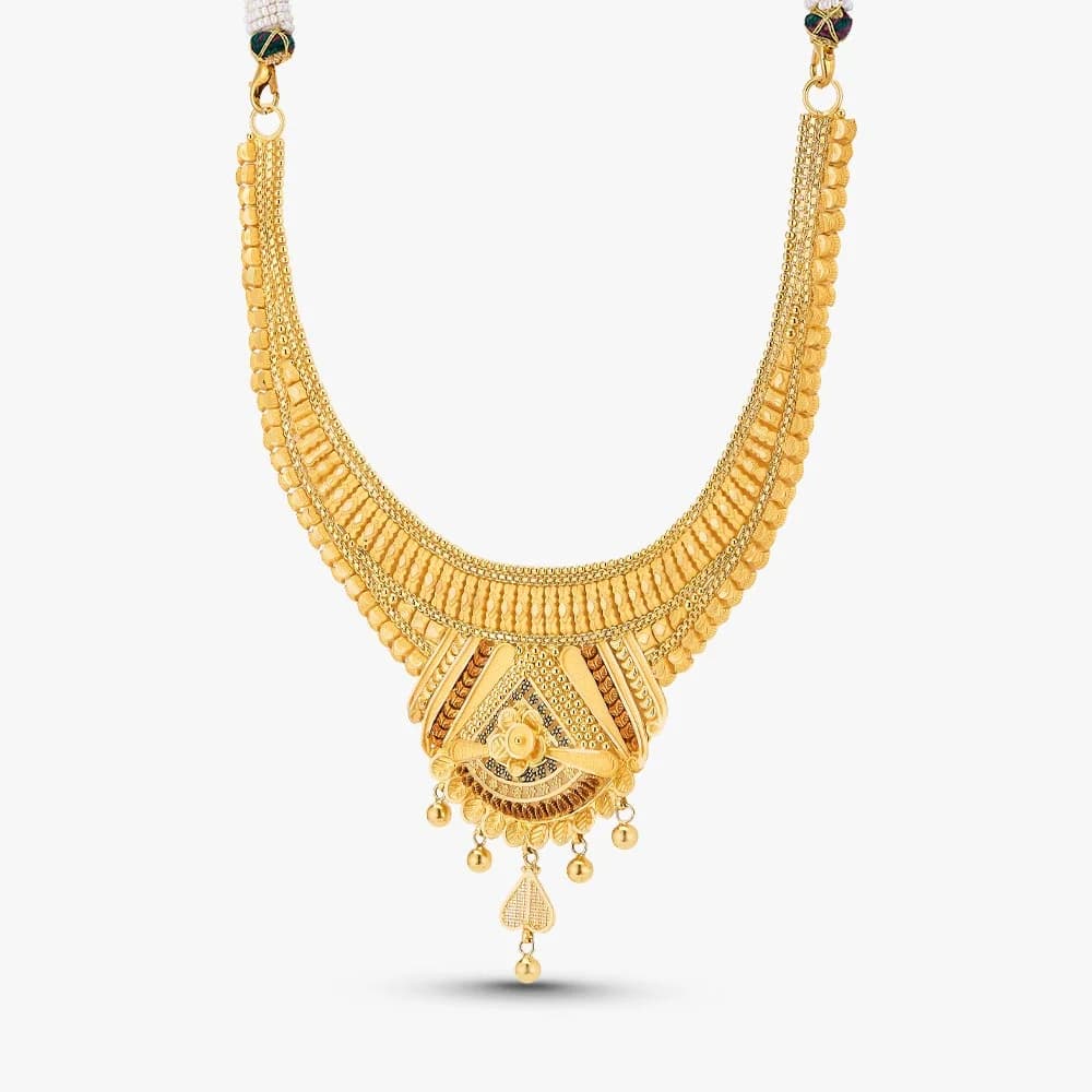 एथनिक क्रेस्ट गोल्ड नेकलेस सेट — image 3